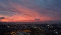 A beautiful yellow, red, orange and blue sunset in the clouds over Curitiba, Brazil with black clouds Royalty Free Stock Photo