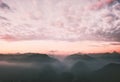 Sunset clouds sky and mountains range landscape Royalty Free Stock Photo