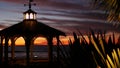 Sunset cloudscape, gazebo on beach, twilight dusk, dramatic sky. Alcove and vane Royalty Free Stock Photo