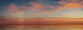 Sunset Cloudy sky blue white clouds and pink yellow sunset at sea banner template background Royalty Free Stock Photo