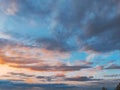 Sunset cloudy sky with picturesque clouds lit by warm sunset sunlight, colorful sunset sky with dramatic sky clouds lit by evening Royalty Free Stock Photo