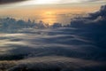 Sunset cloudy sky view from airplane window Royalty Free Stock Photo