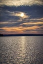 Sunset in cloudy weather over the lake Royalty Free Stock Photo