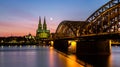 Sunset at Cologne City with cathedral and Hohenzollern bridge Royalty Free Stock Photo