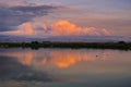 Sunset colored clouds over Santa Cruz mountains reflected in the ponds of south San Francisco bay, Sunnyvale, California Royalty Free Stock Photo