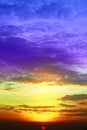 Sunset colorful red orange purple cloud on light dark orange sky Royalty Free Stock Photo