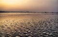 Sunset colorfull pink and violet in a tropical beach goa india with sand