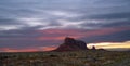 Sunset colors behind Eagle Mesa in Monument Valley Royalty Free Stock Photo