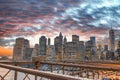 Sunset colors of Downtown Manhattan as seen from Brooklyn Bridge, NYC Royalty Free Stock Photo