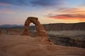 Sunset colors over Delicate Arch in Utah Royalty Free Stock Photo