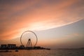 sunset colors over the sea view to the Ain Dubai Royalty Free Stock Photo