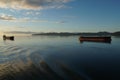 Sunset on the Columbia river connecting port of Portland, Oregon, USA with Pacific Ocean with anchored ships under the blue sky. Royalty Free Stock Photo