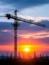Sunset Construction Crane Silhouette Construction site at sunset symbolizing progress industry development ambition and Royalty Free Stock Photo