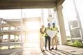 Sunset on the construction site and satisfied team.