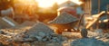 Sunset at the Construction Site: Wheelbarrow and Material Ready for Building Royalty Free Stock Photo