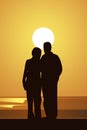 Sunset with couple embracing Royalty Free Stock Photo