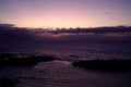 Sunset from a cove that forms a small beach