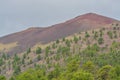 Sunset Crater Volcano is a Cinder Cone. It has Ponderosa Pine trees on its slopes. Coconino County, Arizona Royalty Free Stock Photo