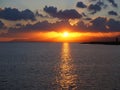 Sunset creating a shining path across the ocean