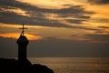 Sunset and crucifix, Vagator, Goa, India