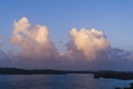 Sunset cumulus clouds on tropical horizon.