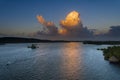 Sunset cumulus clouds on tropical horizon.