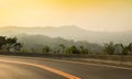 Sunset on curve road in the mountain and forest, country road of Nan in north of Thailand Royalty Free Stock Photo