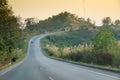 Sunset on curve road in the mountain and forest, country road of Nan in north of Thailand Royalty Free Stock Photo