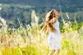 Sunset dancing meadow girl Royalty Free Stock Photo