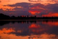 Sunset with dark and red clouds in a beautiful landscape Royalty Free Stock Photo