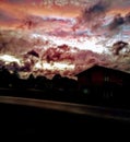 Sunset dark sky crazy clouds Royalty Free Stock Photo