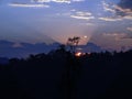 Sunset dawn mountain ray lights bluesky clouds silhouette trees