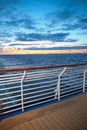 Sunset from the deck of a cruise ship across the ocean, cruising the Mediteranean Sea Royalty Free Stock Photo