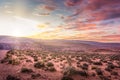 Sunset on desert landscape with a natural bridge in Southern Utah Royalty Free Stock Photo