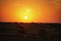 Sunset in the desert Royalty Free Stock Photo