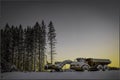 Sunset with digger and truck Royalty Free Stock Photo