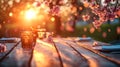 Sunset Dinner Table with Blossom Branches and Glasses Royalty Free Stock Photo