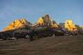 Sunset in the Dolomites, Italy. The peaks are illuminated by the setting sun. Winter landscape mountains in Italian dolomites. Royalty Free Stock Photo