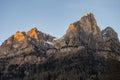 Sunset in the Dolomites, Italy. The peaks are illuminated by the setting sun. Winter landscape mountains in Italian dolomites. Royalty Free Stock Photo