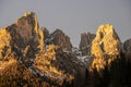 Sunset in the Dolomites, Italy. The peaks are illuminated by the setting sun. Winter mountains in Civetta, Italian dolomites Royalty Free Stock Photo