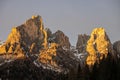 Sunset in the Dolomites, Italy. The peaks are illuminated by the setting sun. Winter mountains in Civetta, Italian dolomites Royalty Free Stock Photo