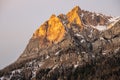 Sunset in the Dolomites, Italy. The peaks are illuminated by the setting sun. Winter mountains in Civetta, Italian dolomites Royalty Free Stock Photo