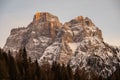 Sunset in the Dolomites, Italy. The peaks are illuminated by the setting sun. Winter mountains in Civetta, Italian dolomites Royalty Free Stock Photo