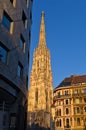 Sunset at downtown of Vienna, detail of Haas House and Saint Stephan's cathedral in background