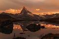 Sunset with dramatic alpenglow at the high mountain lake Stelisee with the famous Alps peak Matterhorn Royalty Free Stock Photo