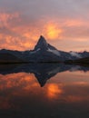 Sunset with dramatic alpenglow at the high mountain lake Stellisee with Alps peak Matterhorn, Royalty Free Stock Photo