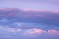 Sunset dramatic with beautiful layer of pastel violet clouds sky background Royalty Free Stock Photo