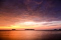 Sunset with dramatic clouds on the tropical beach Royalty Free Stock Photo