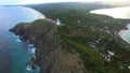 Australian landscape, aerial view. Green wild forest. Aerial forest view. Wild rocky beach with beautiful waves. Australian landma