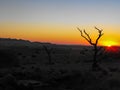 Sunset in dry desert mountain area Royalty Free Stock Photo